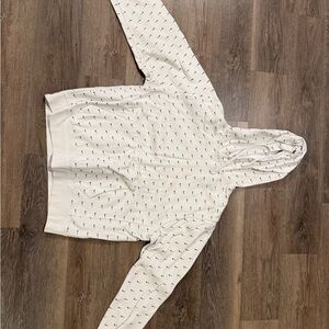 Nike White Hoodie with Black Swoosh Pattern